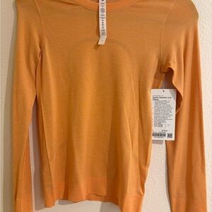 Lululemon Athletica Swiftly Relaxed Long Sleeve in Orange